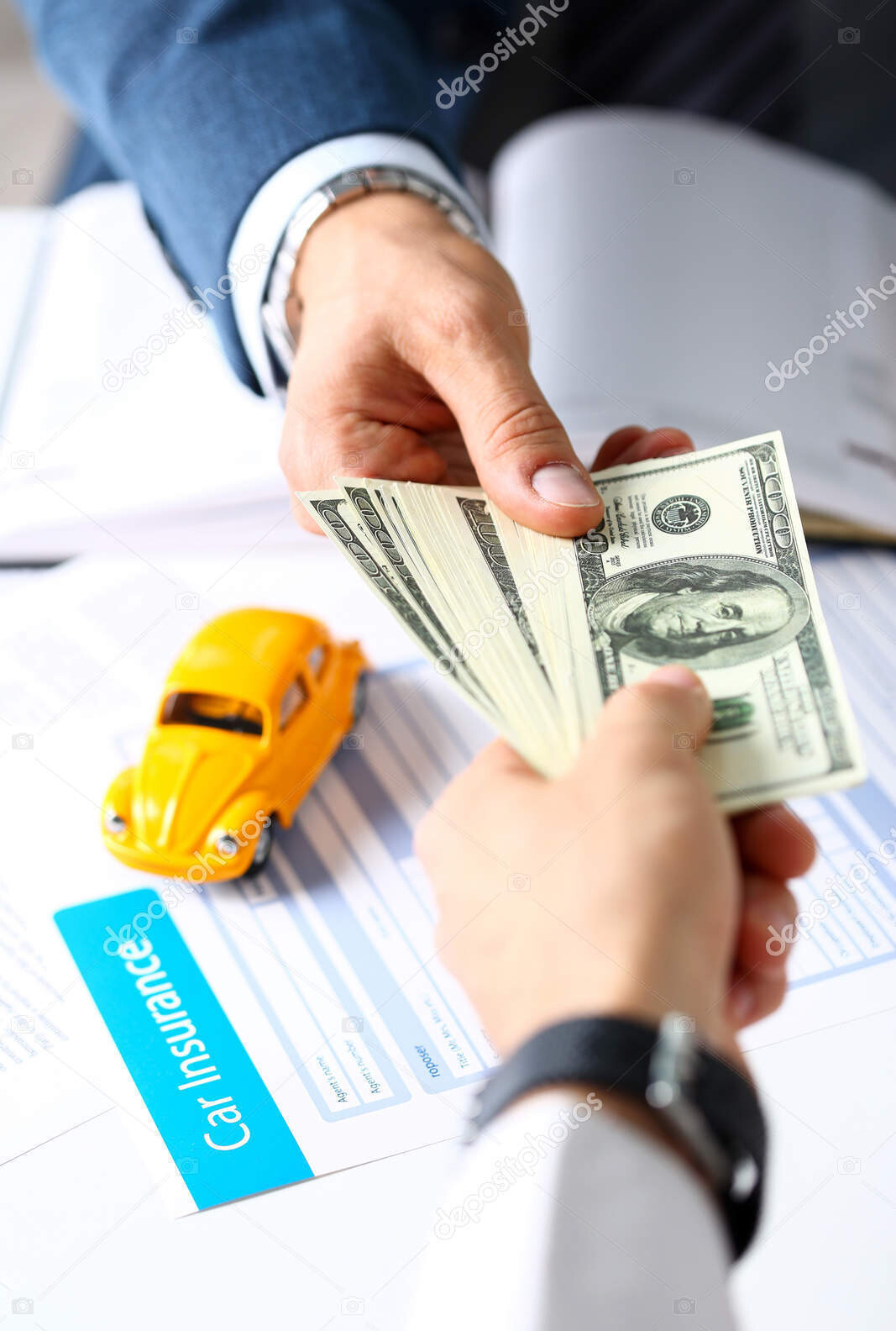 client arm give pack of hundred dollars bills