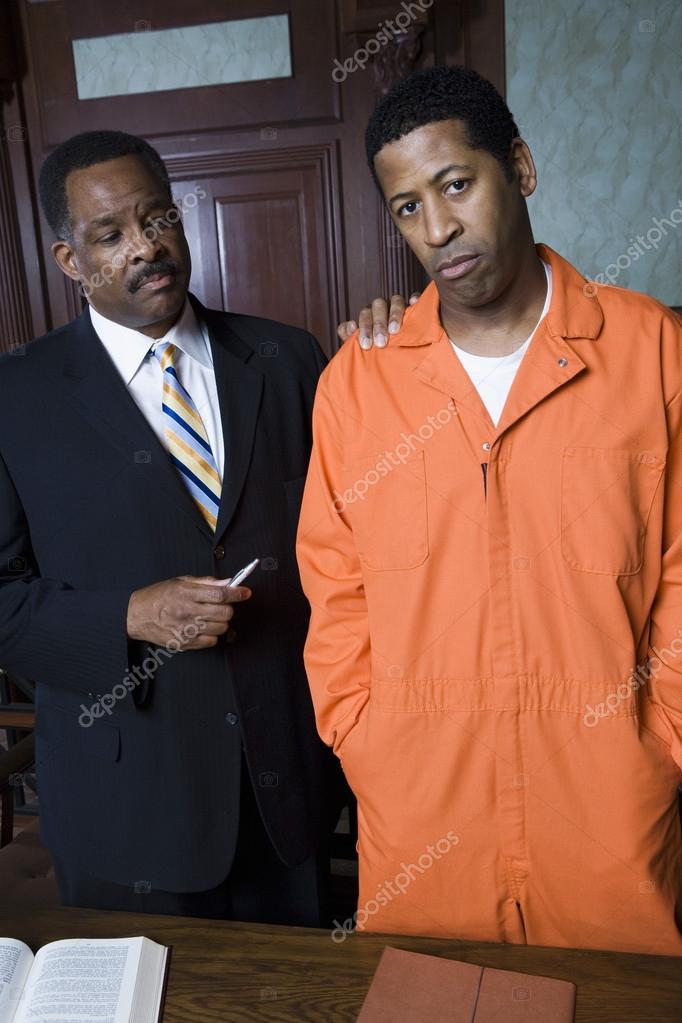 depositphotos 21972557 stock photo criminal with lawyer in court