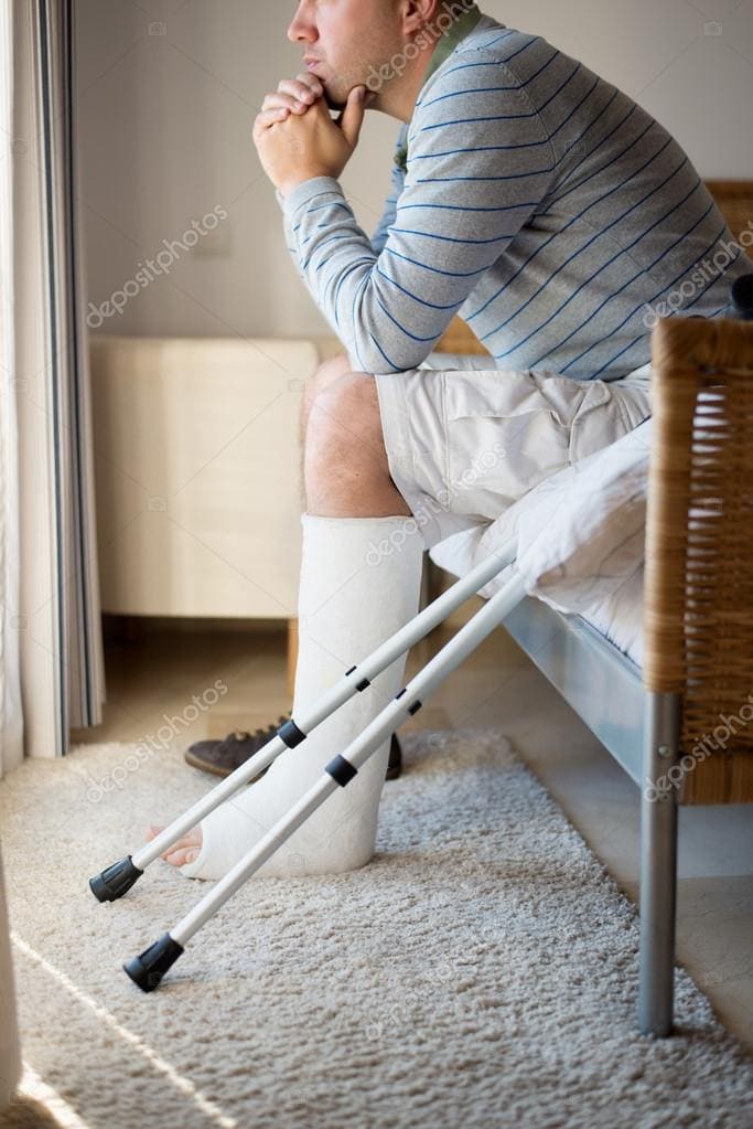 depositphotos 25849393 stock photo injured man in deep thoughts