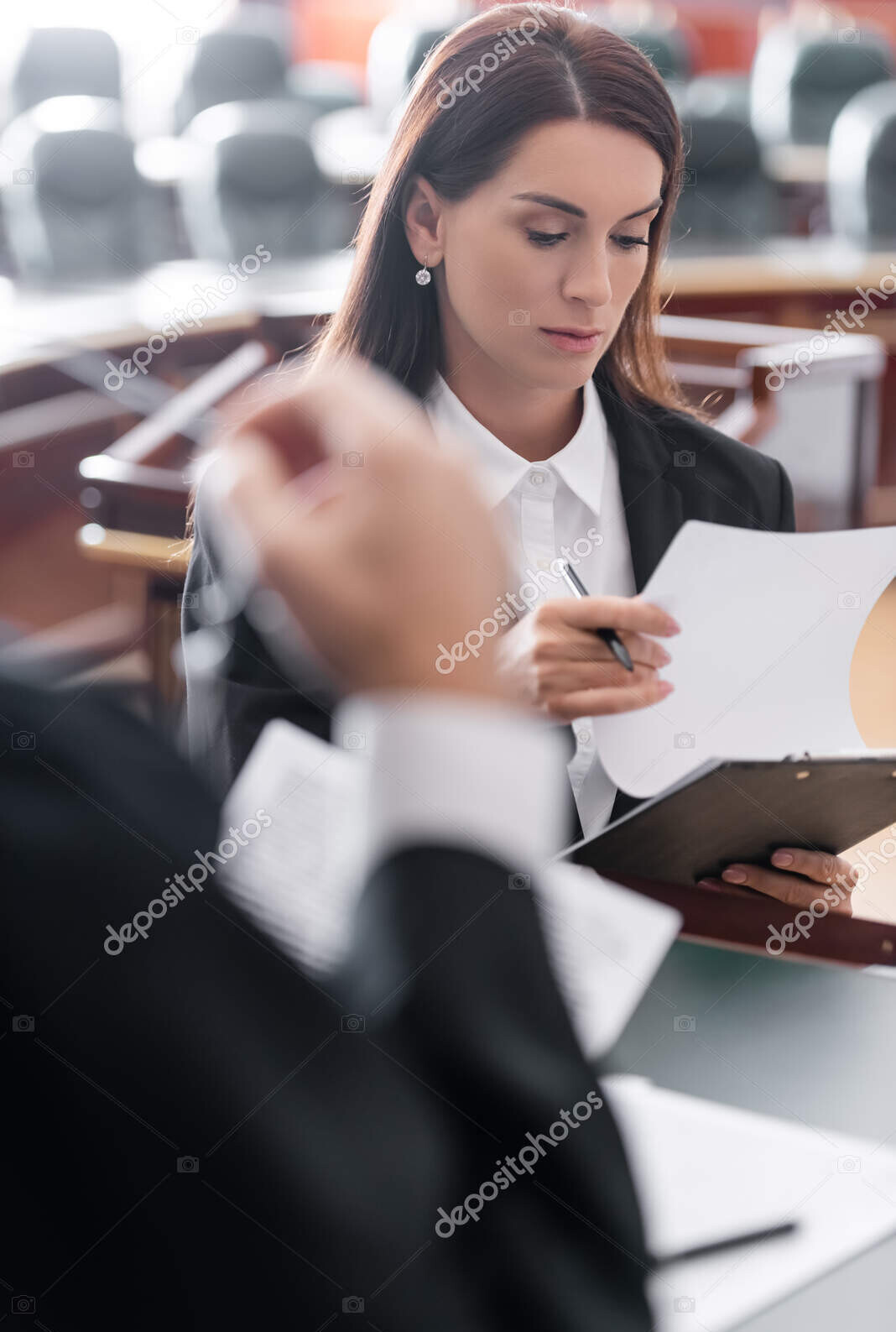 depositphotos 545925272 stock photo prosecutor looking document judge blurred