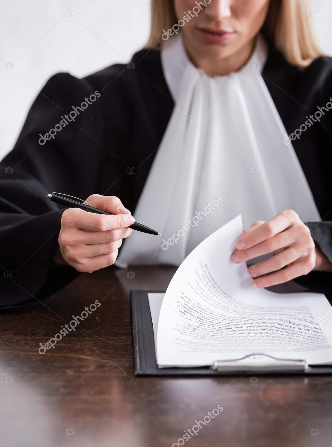 depositphotos 557666774 stock photo partial view blurred judge holding