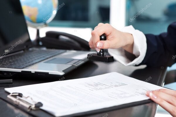 depositphotos 5615160 stock photo stamping document