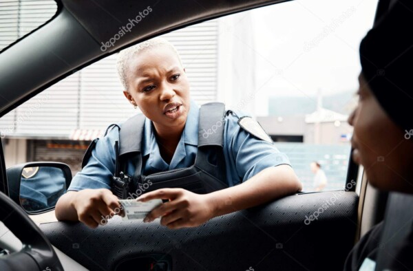 depositphotos 684977414 stock photo talking drivers license police officer