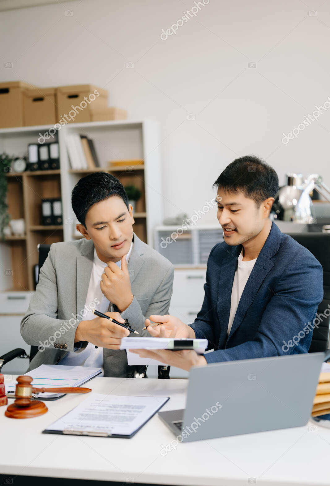 depositphotos 704944396 stock photo asian business team lawyers discussing